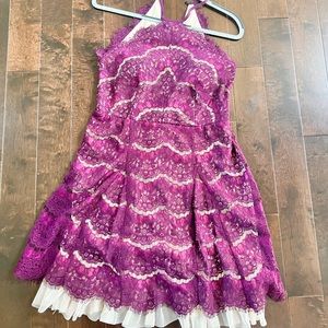 Francesca’s lace burgundy and nude dress
